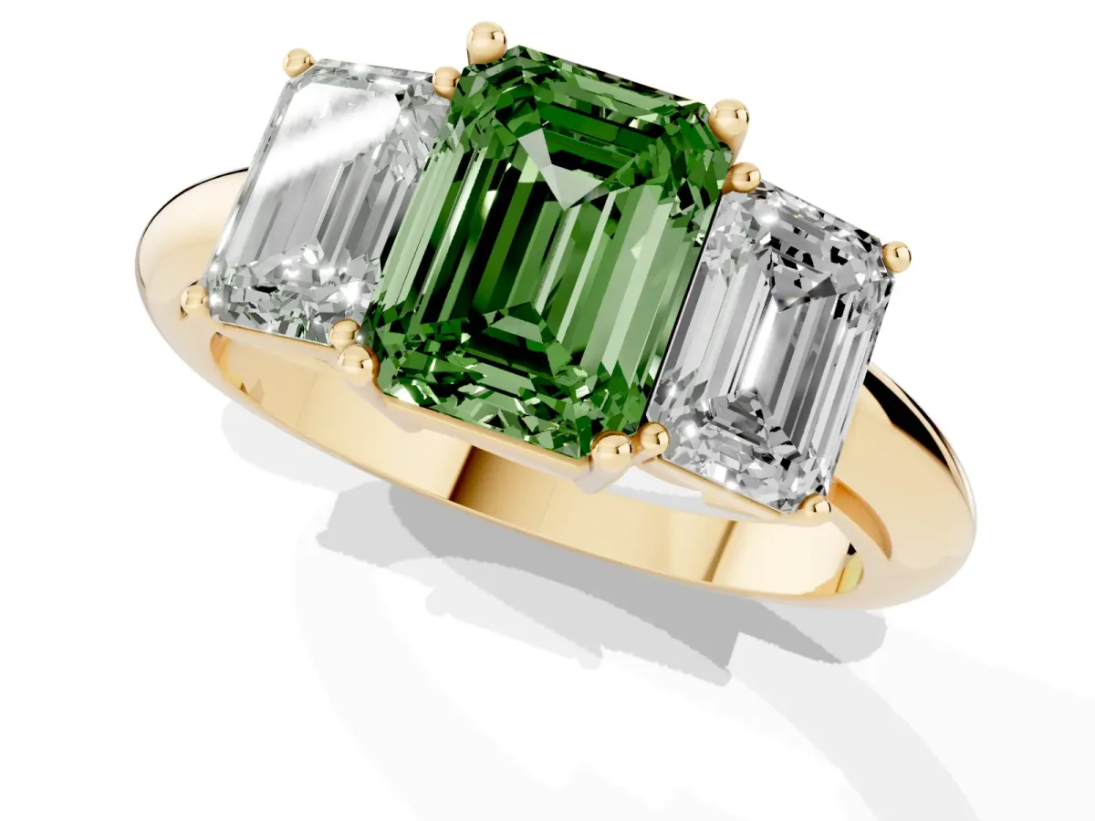 Fancy Green Three-Stone Emerald Cut Cut Diamond Engagement Ring with Prong Setting on a White Gold Band Yellow gold