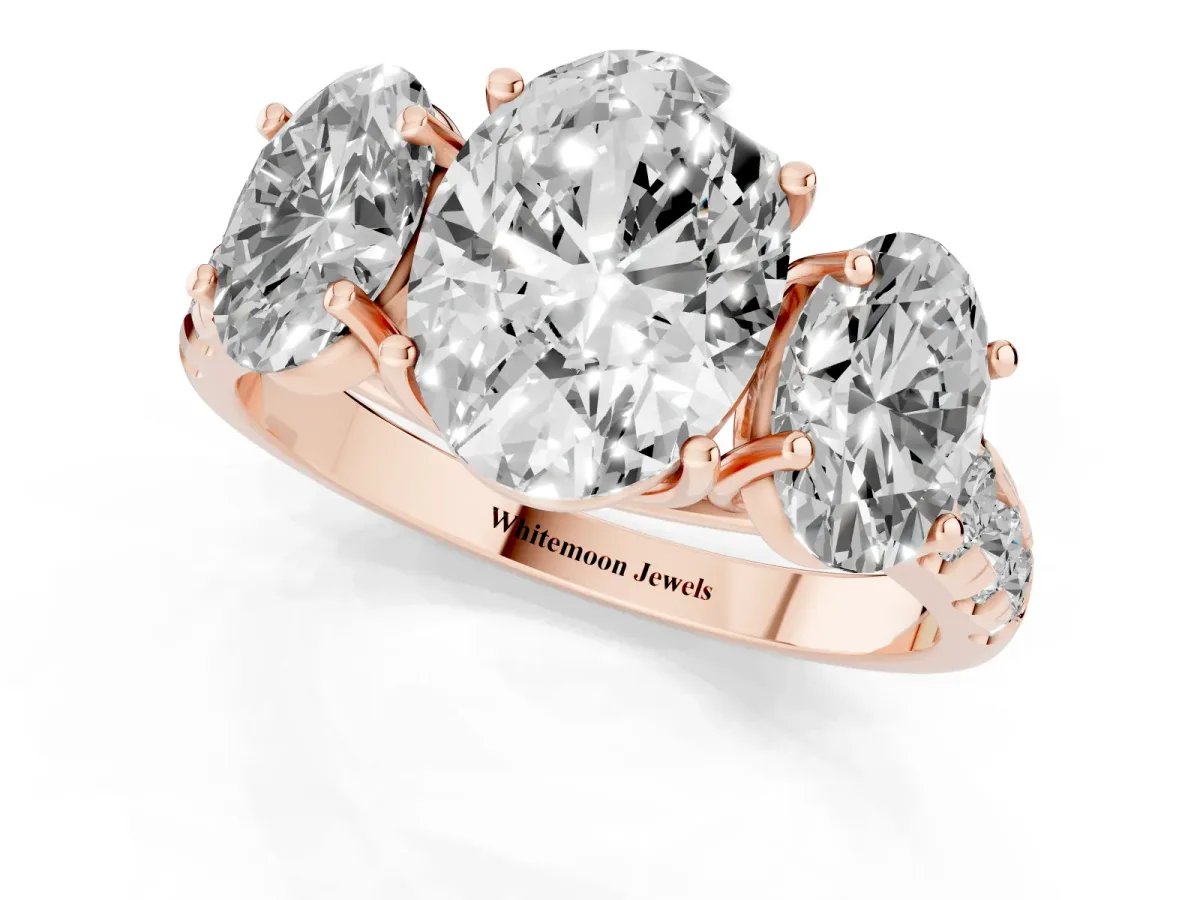 Three-Stone Oval Cut Diamond Pavé Band with Prong Setting Rose gold