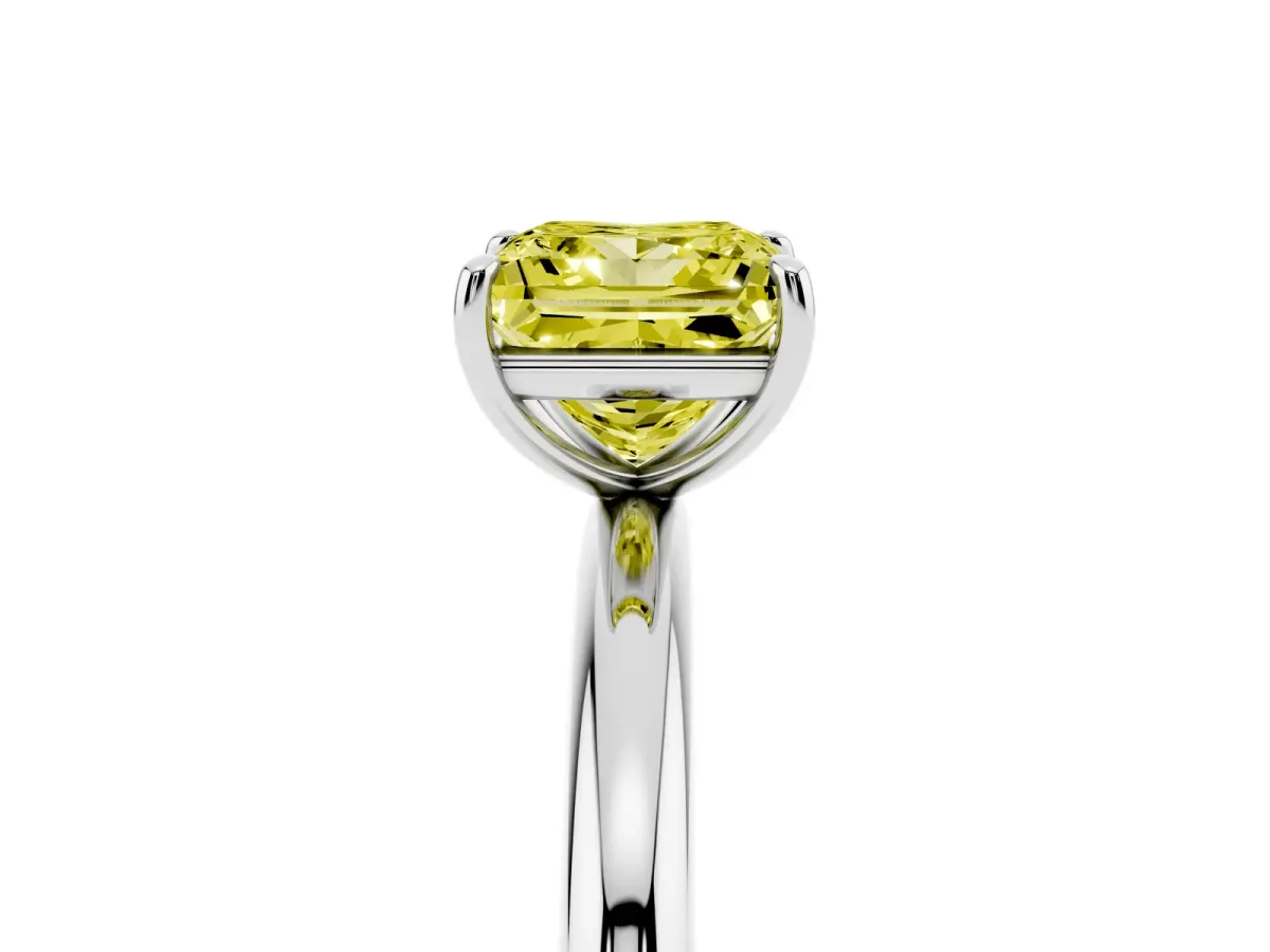 Fancy Yellow Princess Cut Solitaire Diamond Ring with Four-Prong Setting on a Plain Band Silver