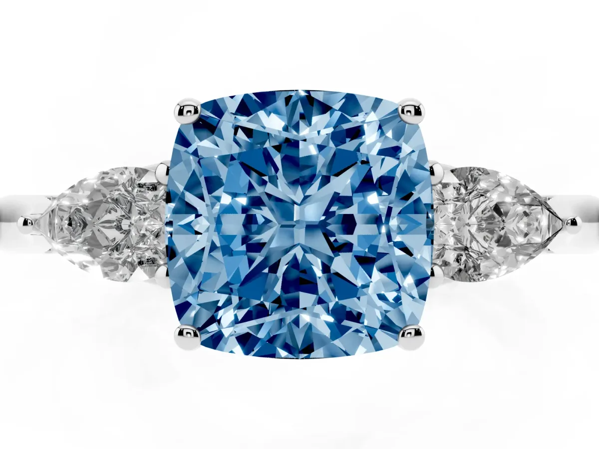 Fancy Blue Three-Stone Cushion Cut Diamond Ring with Pear Side Stones in Four-Prong Setting Silver