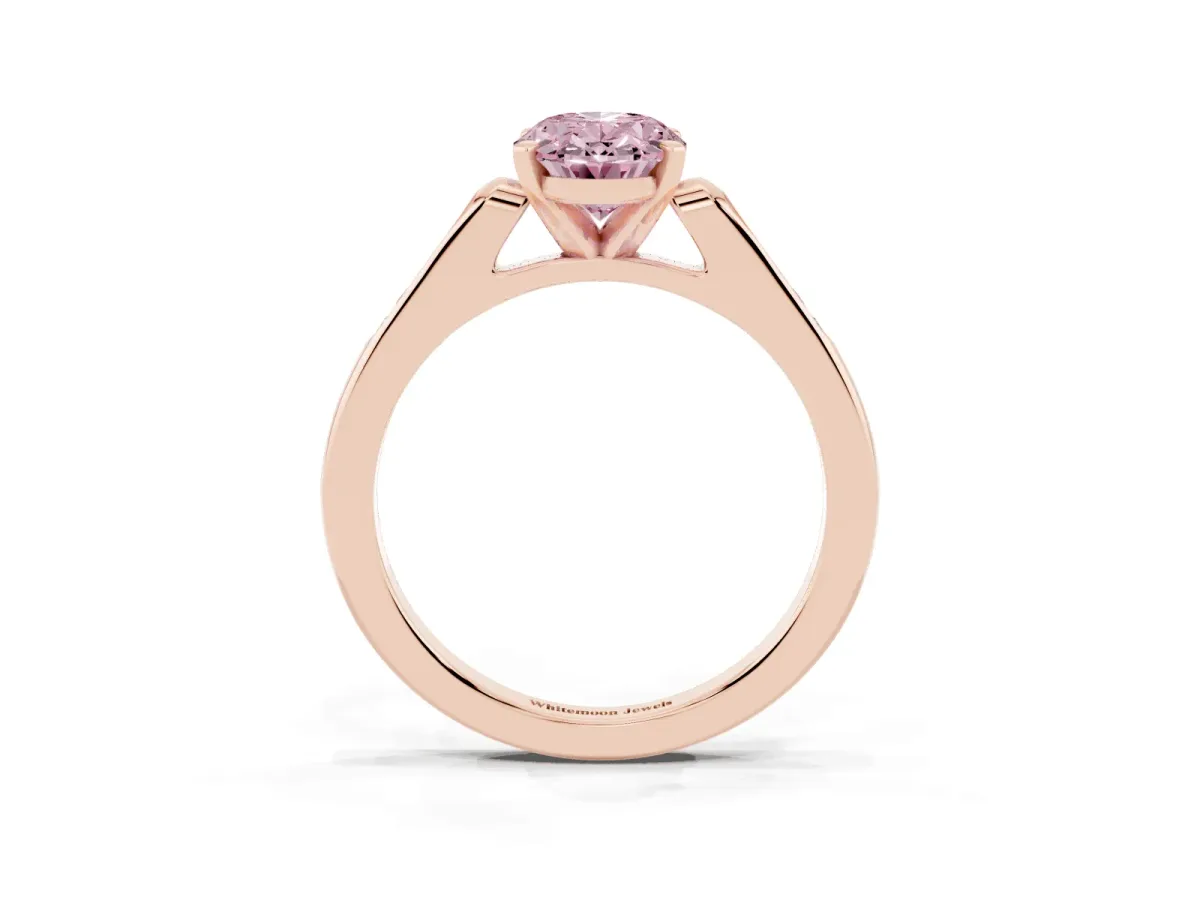 Fancy Pink Oval Cut Diamond Solitaire Ring with Channel Set Round Band and Prong Setting Rose gold