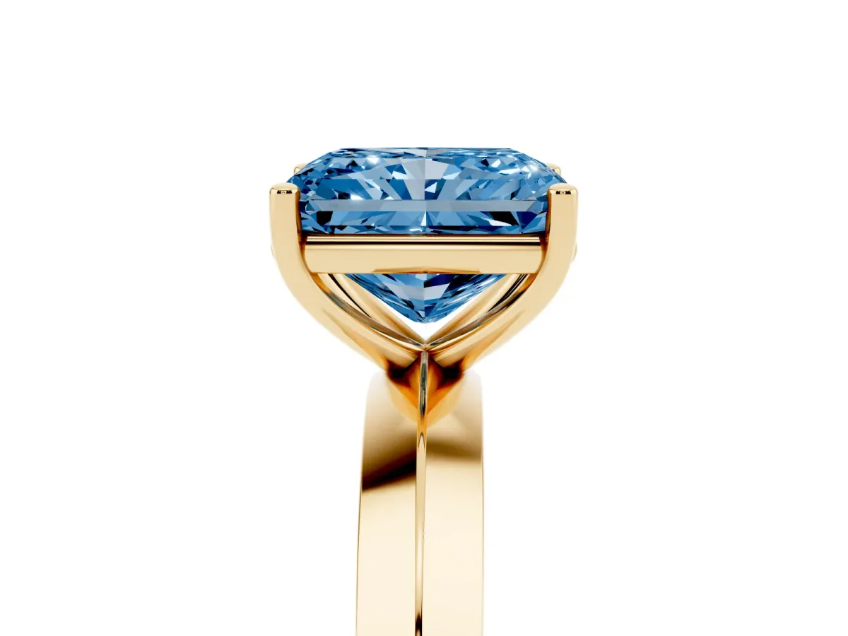 Fancy Blue Radiant Cut Cut Solitaire Engagement Ring with Flat Band and Four-Prong Setting Yellow gold