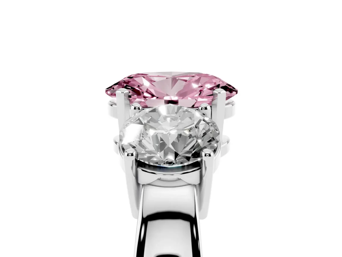 Fancy Pink Three-Stone Oval Cut Diamond Ring with Round Side Stones, Classic Band, and Four-Prong Setting Silver