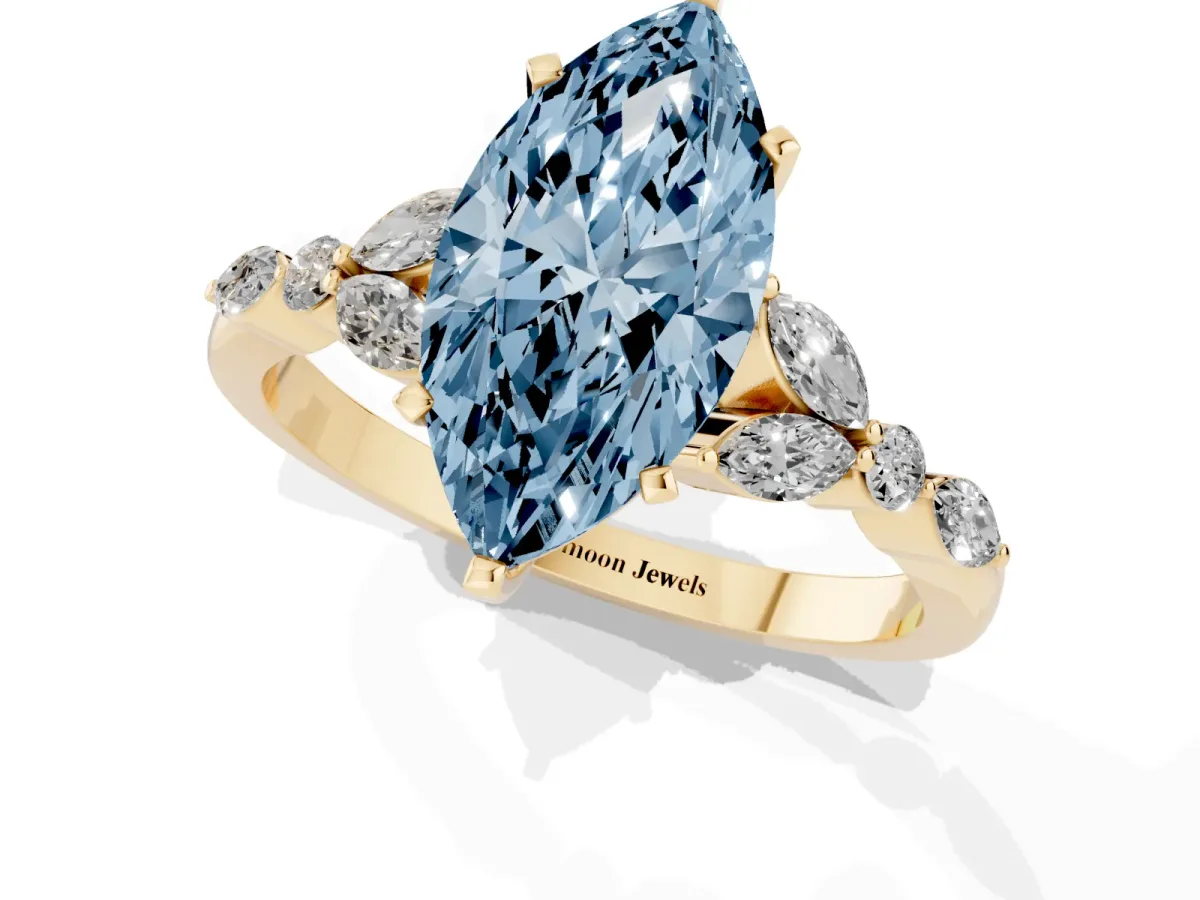 Fancy Blue Marquise Cut Diamond Solitaire Ring with Side Stones and Four-Prong Setting Yellow gold
