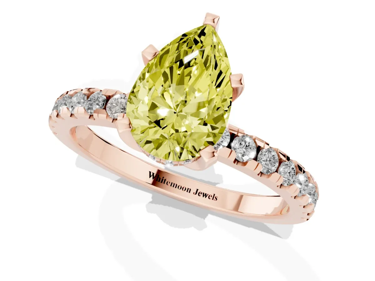 Fancy Yellow Pear Cut Diamond Solitaire Ring with Round Pavé Band and Four-Prong Setting Rose gold