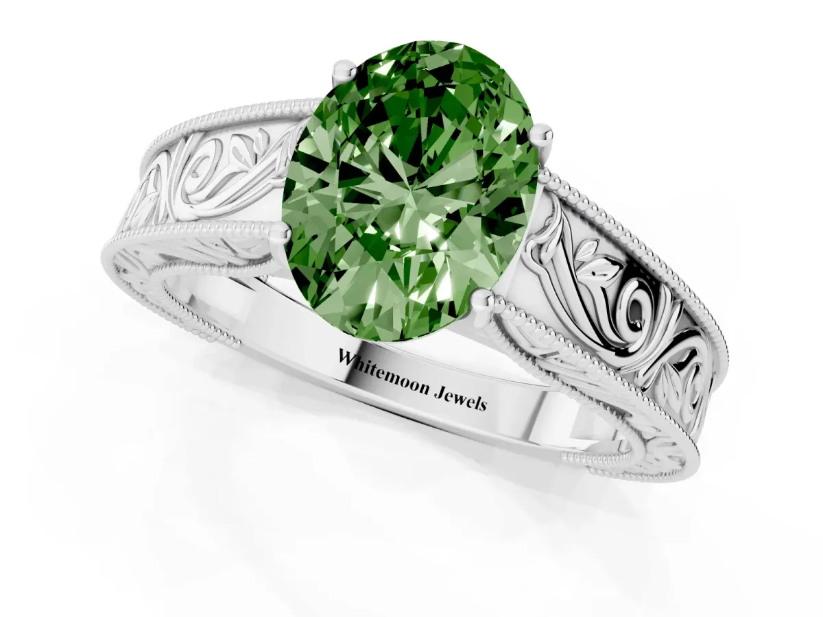 Fancy Green Oval Cut Diamond Solitaire Ring with Engraved Band and Four-Prong Setting Platinum