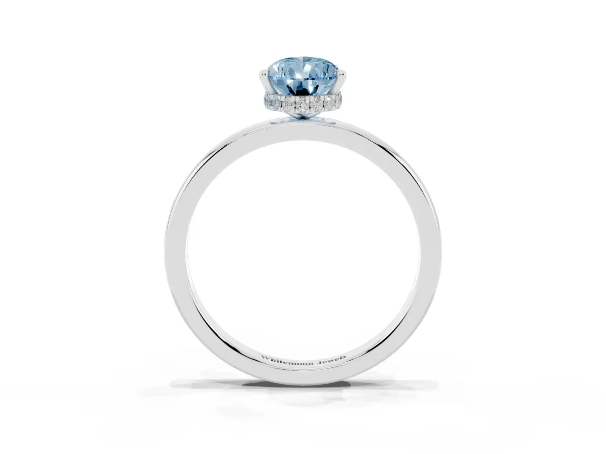 Fancy Blue Pear Cut Solitaire Engagement Ring with Cathedral Band and Four-Prong Setting White gold