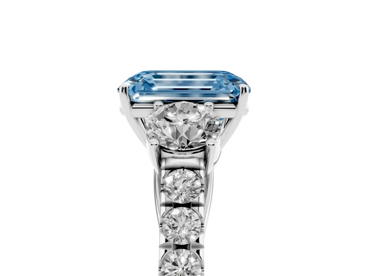 Fancy Blue Emerald Cut Cut Diamond Three-Stone Ring with Round Side Stones and Pavé Band Silver