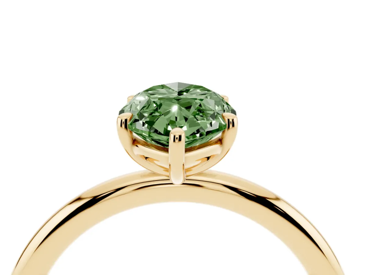 Fancy Green Marquise Cut Solitaire Diamond Ring with Four-Prong Setting on a Plain Band Yellow gold