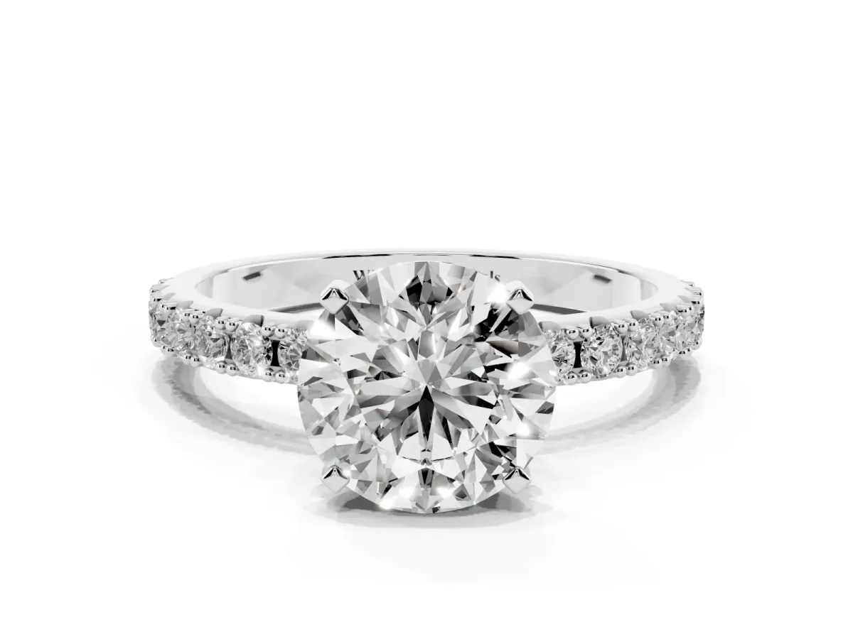 Round Cut Diamond Solitaire Pavé Band with Four-Prong Setting Silver