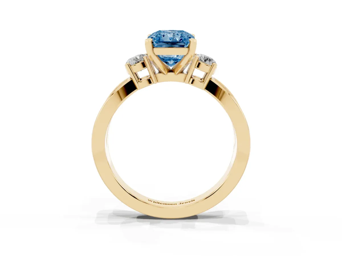 Fancy Blue Three-Stone Radiant Cut Cut Diamond Twist Band with Prong Setting Yellow gold
