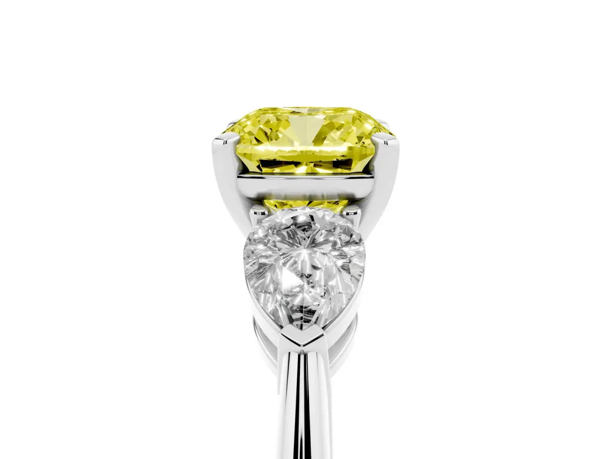 Fancy Yellow Three-Stone Cushion Cut Diamond Ring with Pear Side Stones and Four-Prong Setting Silver