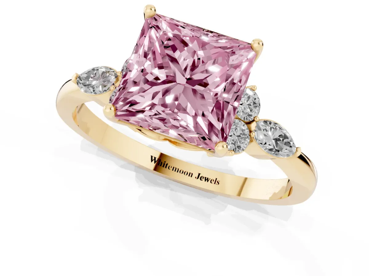 Fancy Pink Princess Cut Brilliant Diamond Solitaire Ring with Pear Side Stones and Four-Prong Setting Yellow gold