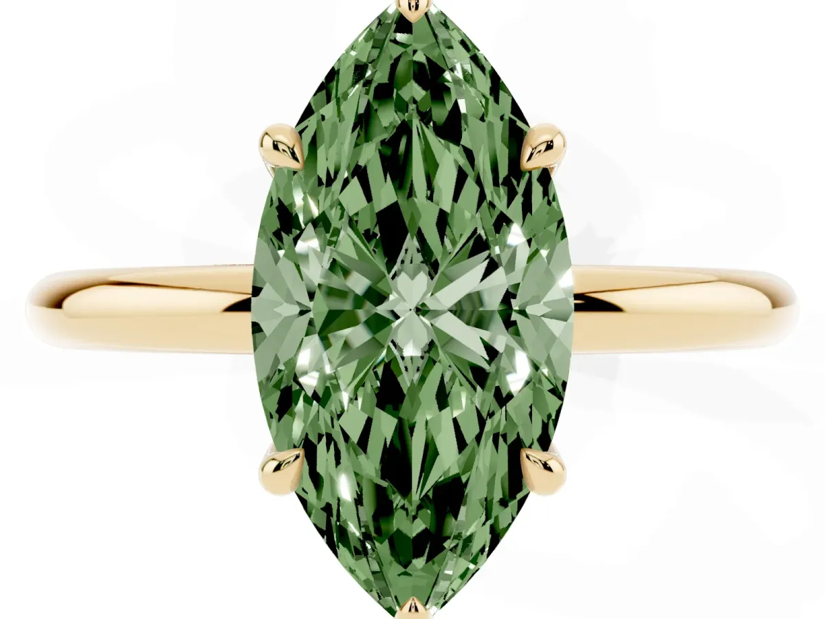 Fancy Green Marquise Cut Diamond Solitaire Ring with Thin Band and Four-Prong Setting Yellow gold