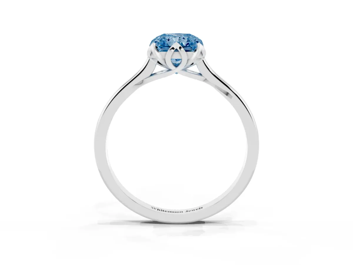 Fancy Blue Radiant Cut Diamond Solitaire Ring with Flower Prong Setting and Classic Band Silver