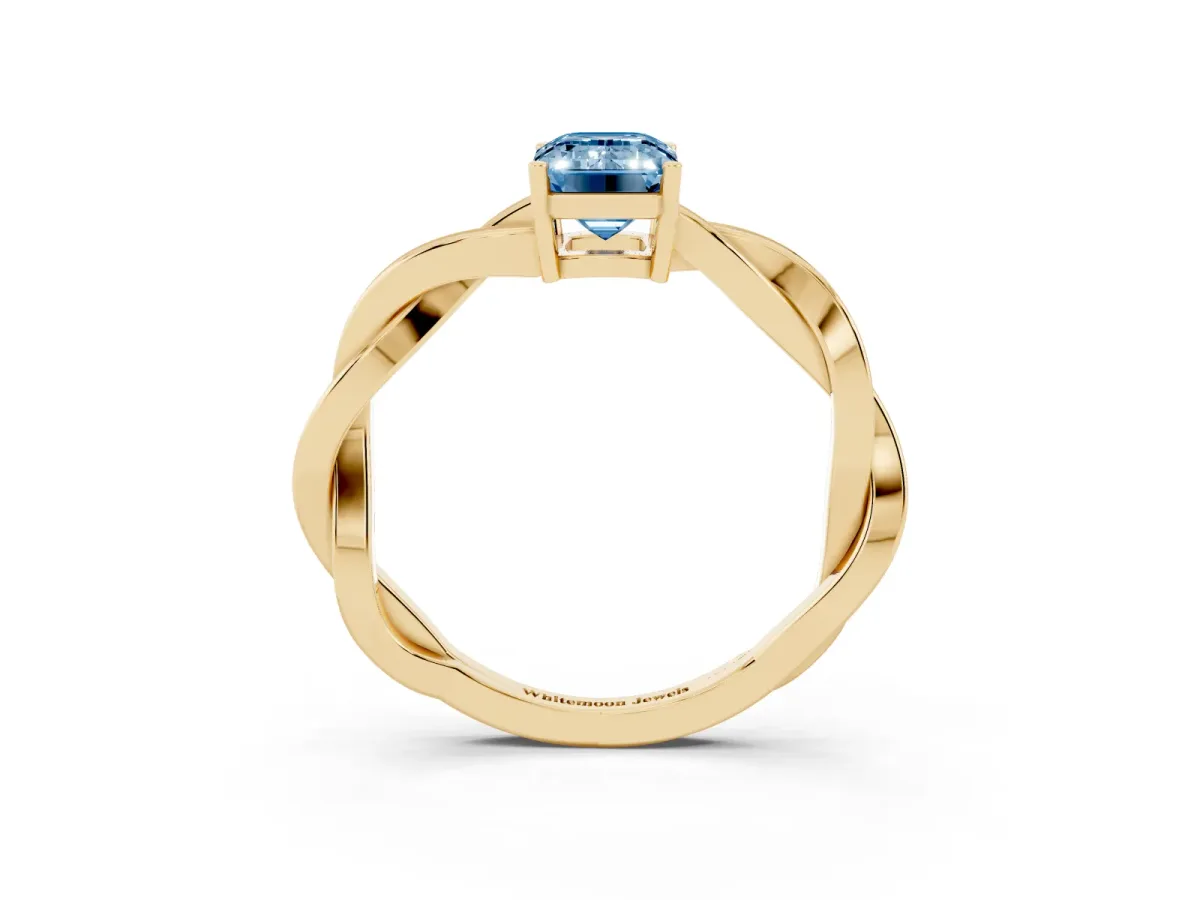 Fancy Blue Emerald Cut Solitaire Twisted Pave Diamond Ring with Four-Prong Setting Yellow gold