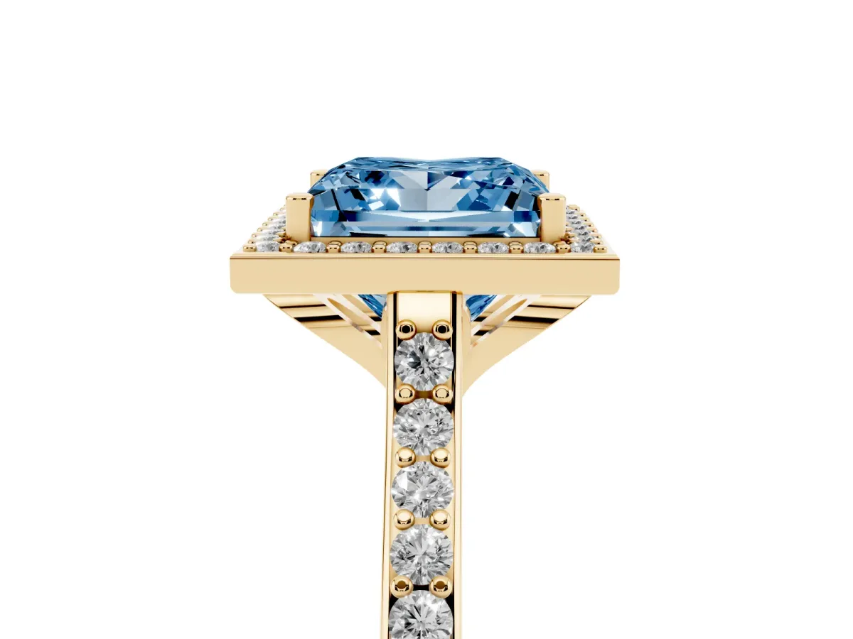 Fancy Blue Princess Cut Diamond Halo Engagement Ring with Round Pavé Shoulders and Prong Setting Yellow gold
