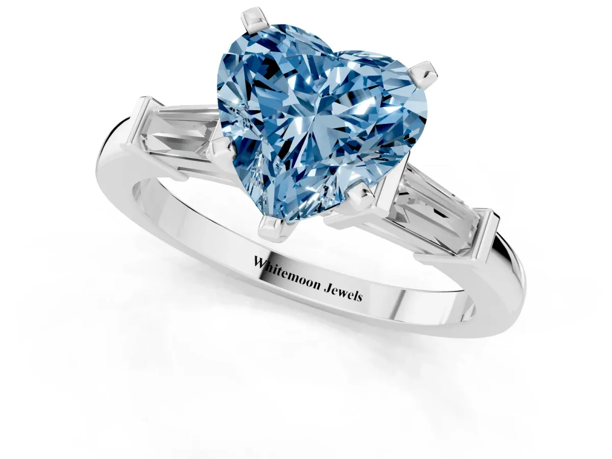 Fancy Blue Heart Cut Cut Diamond Solitaire Ring with Tapered Baguette Accents and Four-Prong Setting Silver
