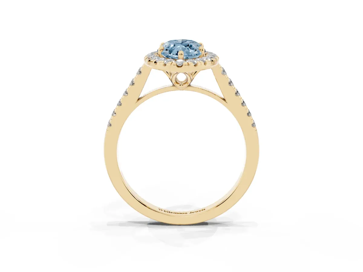 Fancy Blue Marquise Cut Halo Pavé Diamond Engagement Ring with Four-Prong Setting Yellow gold