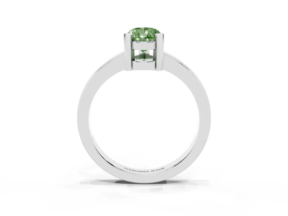 Fancy Green Pear Cut Cut Solitaire Ring with Four-Prong Setting and Classic Band Silver