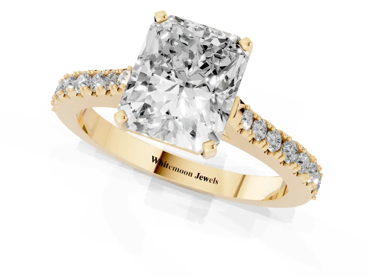 Radiant Cut Cut Solitaire Diamond Engagement Ring with Pave Band and Four-Prong Setting Yellow gold
