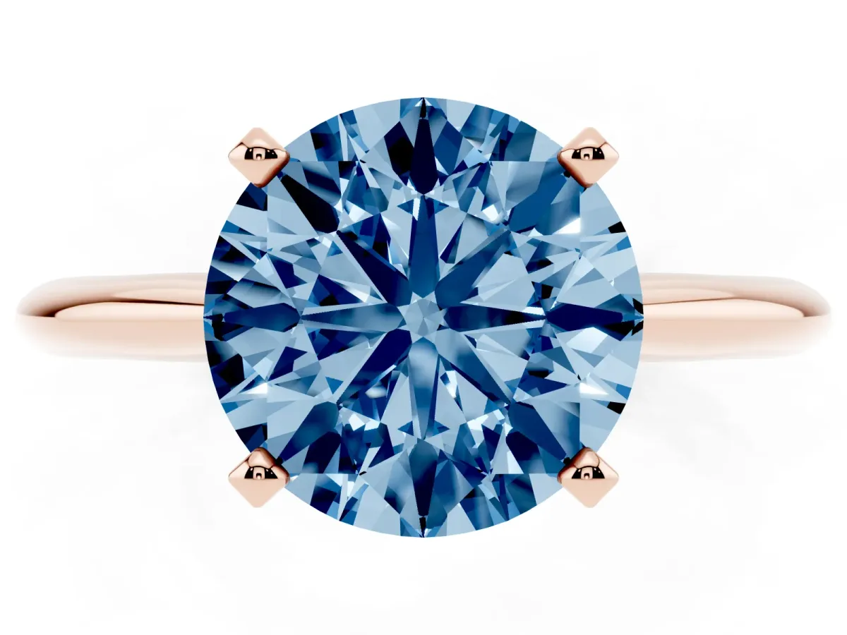 Fancy Blue Round Cut Cut Solitaire Ring with Four-Prong Setting on a Classic Band Rose gold