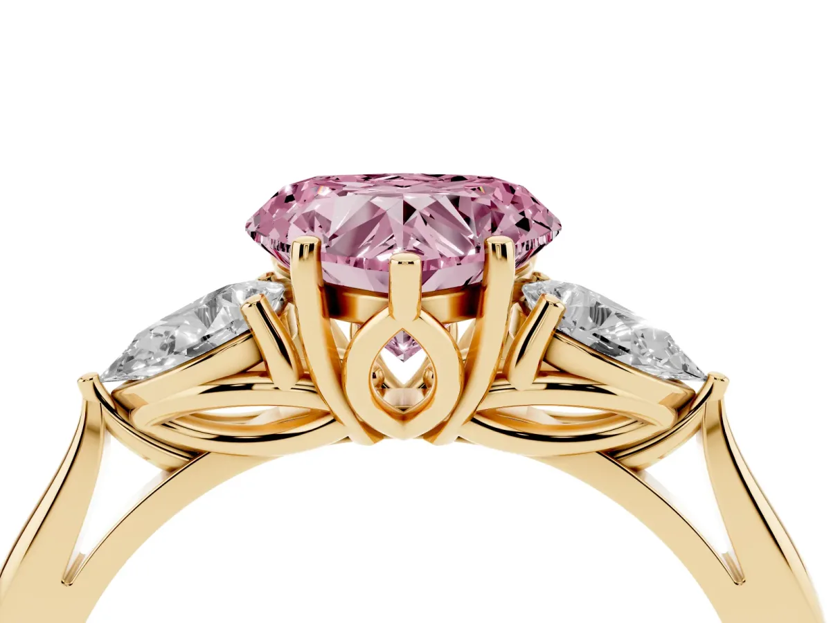 Fancy Pink Heart Cut Diamond Three-Stone Ring with Pear Side Stones and Prong Setting Yellow gold