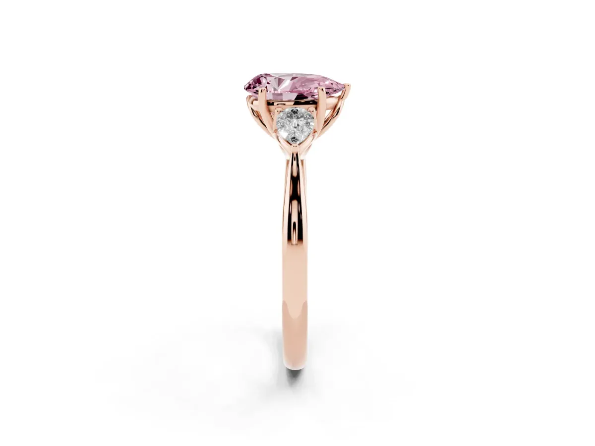 Fancy Pink Three-Stone Pear Cut Diamond Ring with Pear Side Stones in Four-Prong Setting Rose gold