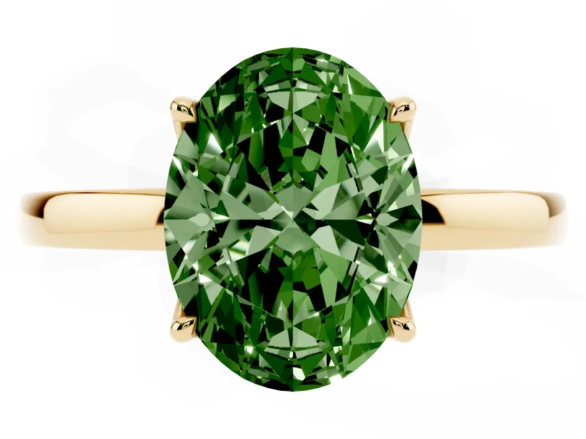 Fancy Green Oval Cut Diamond Solitaire Ring with Thin Band and Prong Setting Yellow gold