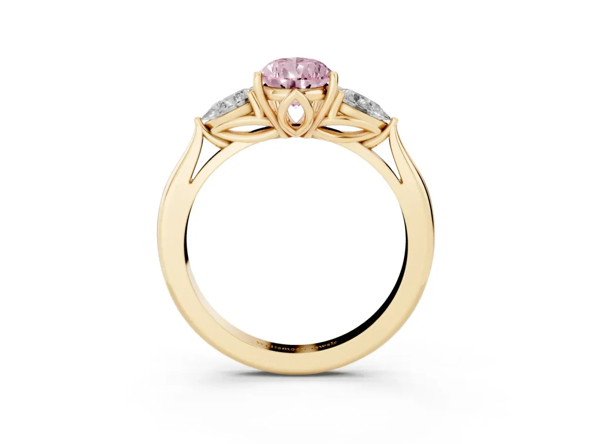 Fancy Pink Pear Cut Diamond Three-Stone Ring with Pear Side Stones and Prong Setting Yellow gold
