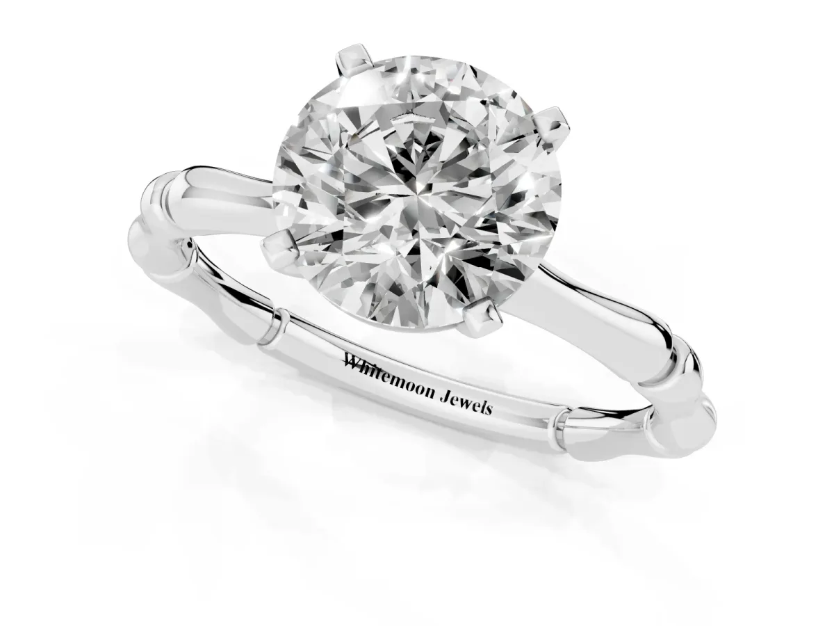 Round Cut Solitaire Diamond Ring with Bamboo Band and Four-Prong Setting Silver