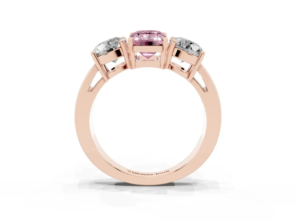 Fancy Pink Three-Stone Emerald Cut Diamond Ring with Round Side Stones, Classic Band, and Four-Prong Setting Rose gold