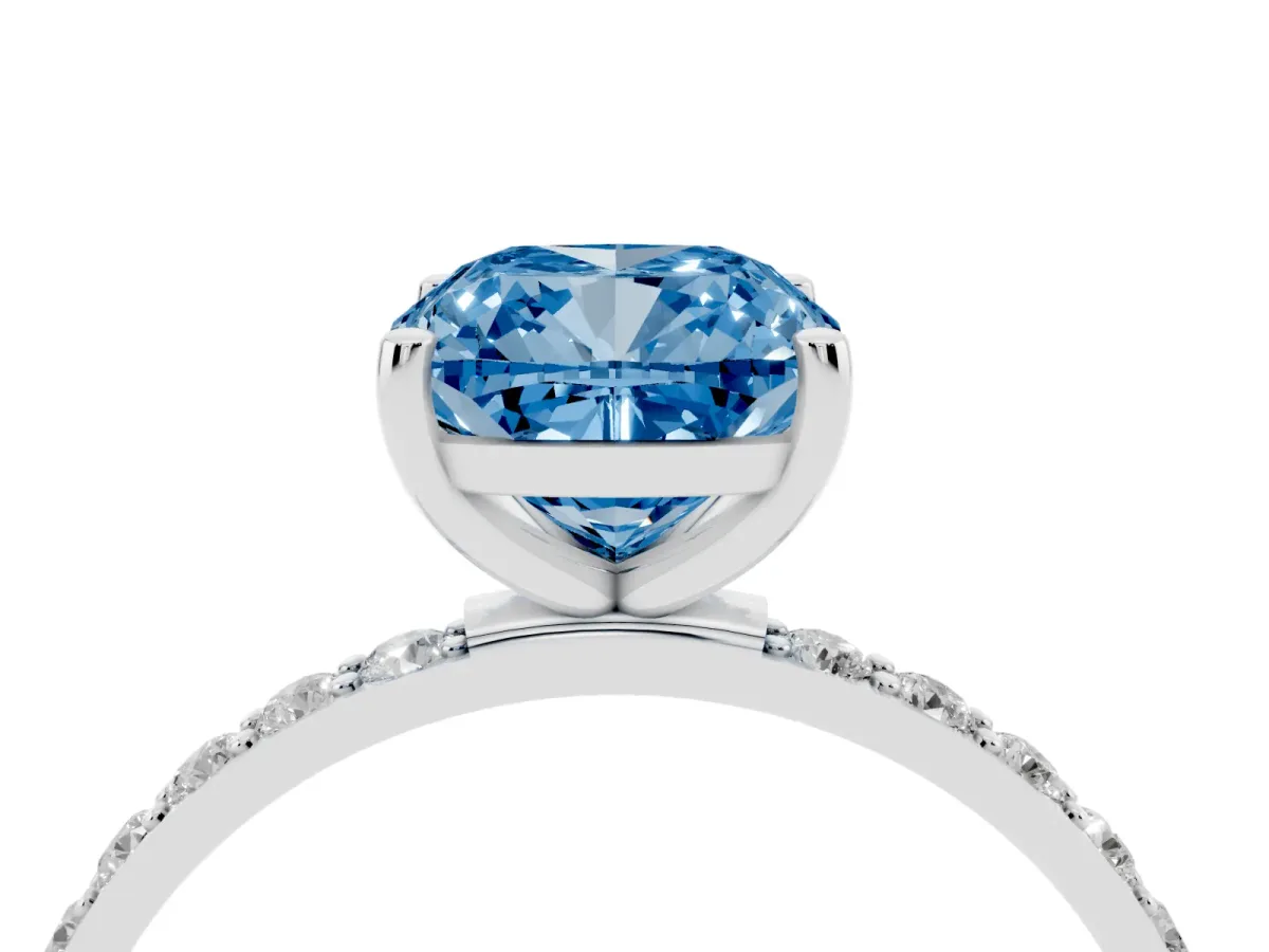 Fancy Blue Cushion Cut Diamond Solitaire Ring with Round Pavé Shoulders and Prong Setting Silver
