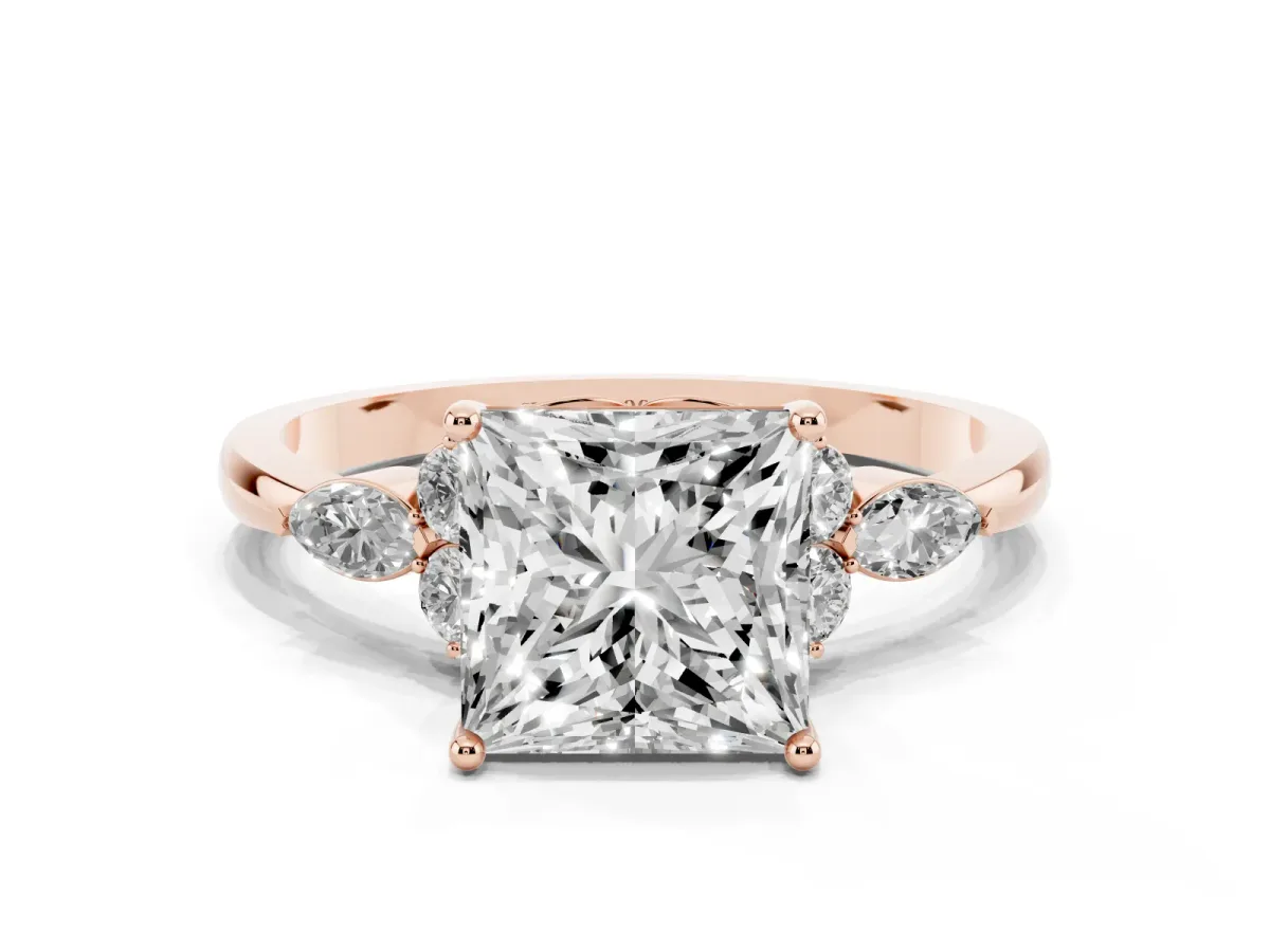 Princess Cut Brilliant Diamond Solitaire Ring with Pear Side Stones and Four-Prong Setting Rose gold