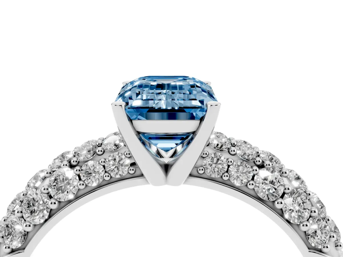 Fancy Blue Emerald Cut Diamond Pavé Band Solitaire Ring with Four-Prong Setting Silver