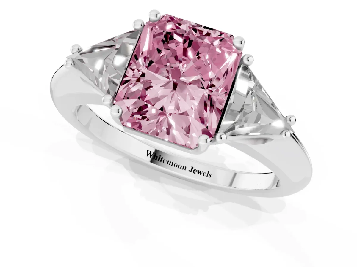 Fancy Pink Three-Stone Radiant Cut Diamond Engagement Ring with Trillion Side Stones and Prong Setting White gold