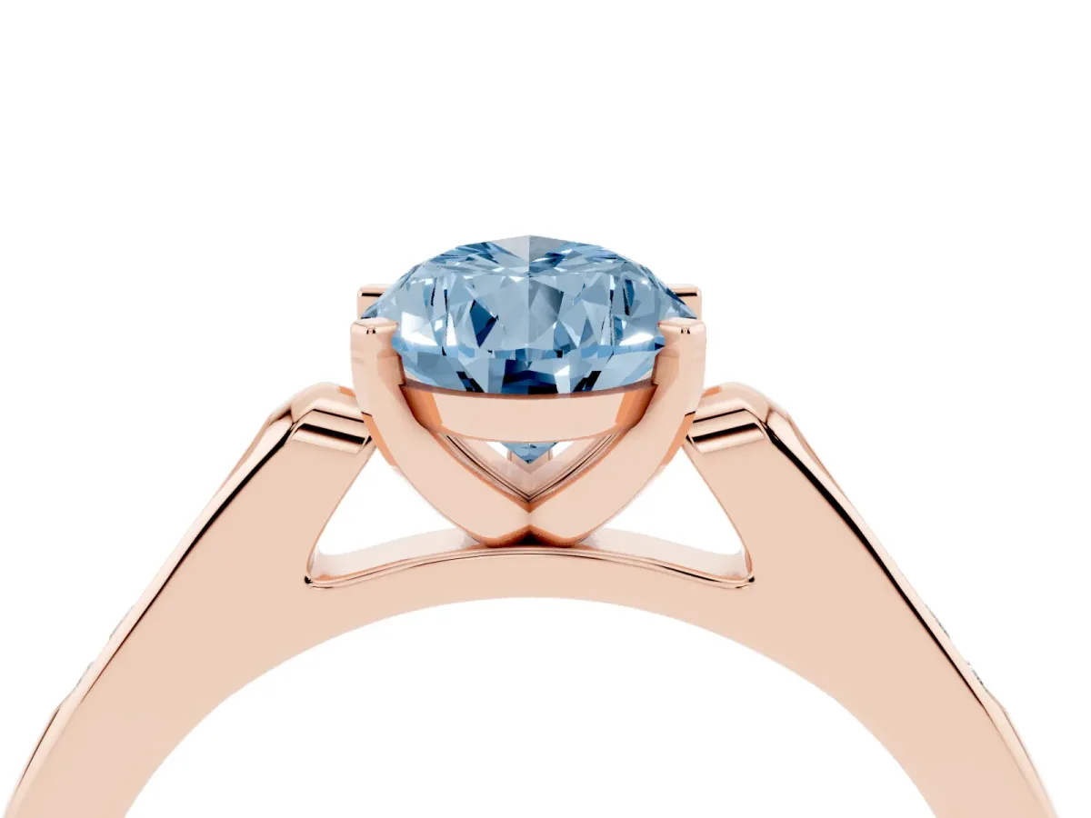 Fancy Blue Pear Cut Diamond Solitaire Ring with Channel Set Round Band and Prong Setting Rose gold