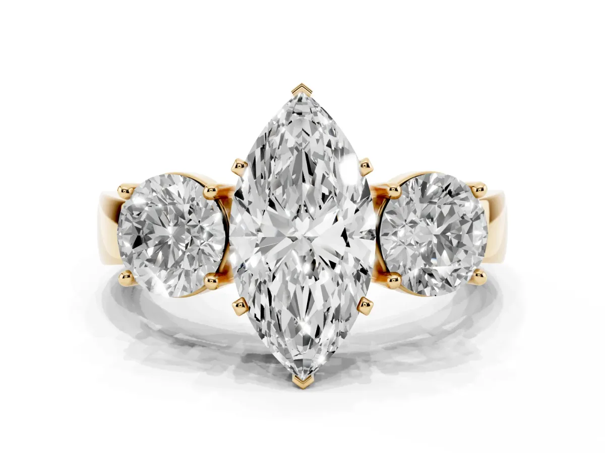 Three-Stone Marquise Cut Diamond Ring with Round Side Stones, Classic Band, and Four-Prong Setting Yellow gold
