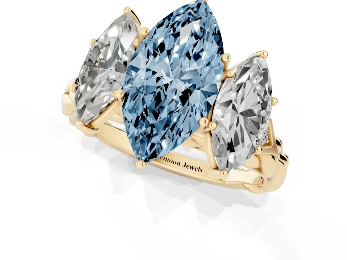 Fancy Blue Three-Stone Marquise Cut Diamond Braided Band Ring with Four-Prong Setting Yellow gold
