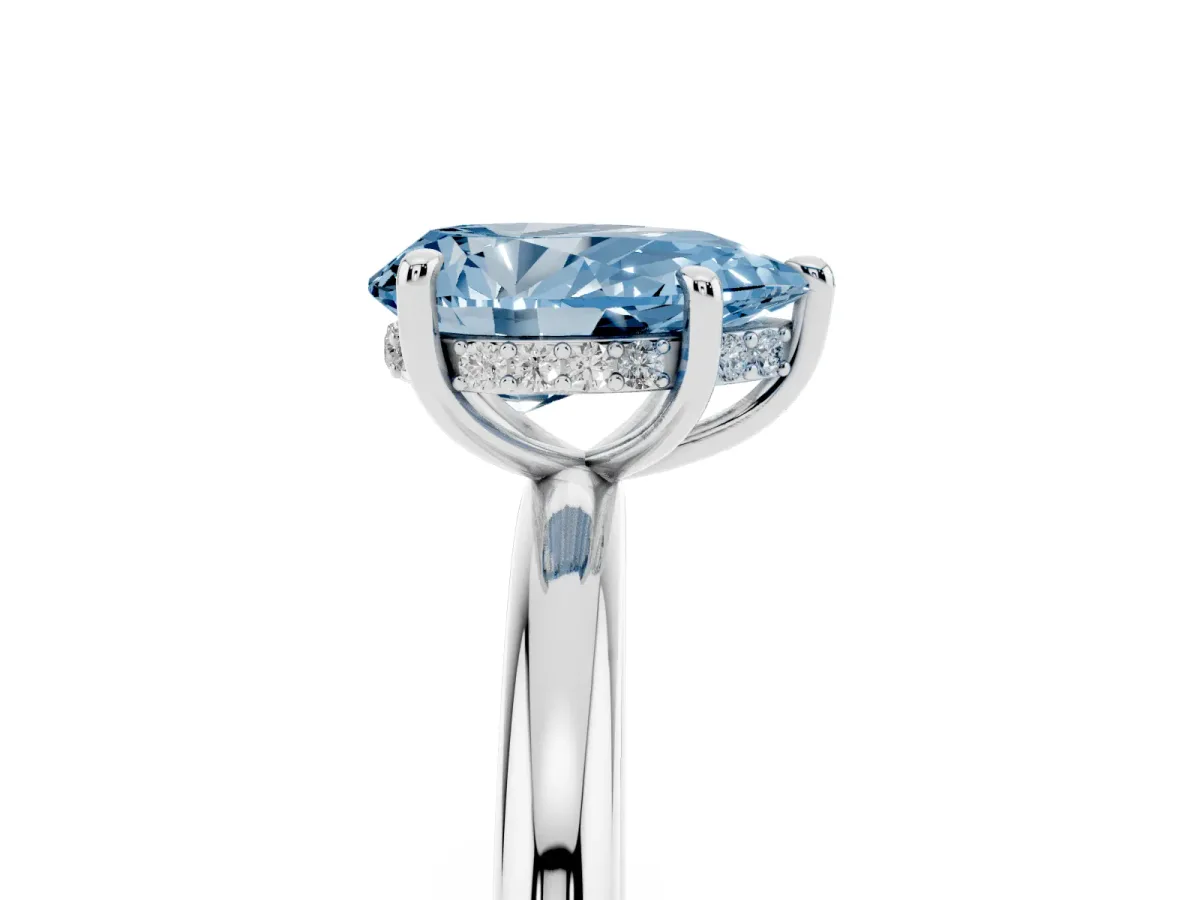 Fancy Blue Pear Cut Diamond Solitaire Ring with Thin Band and Four-Prong Setting Silver