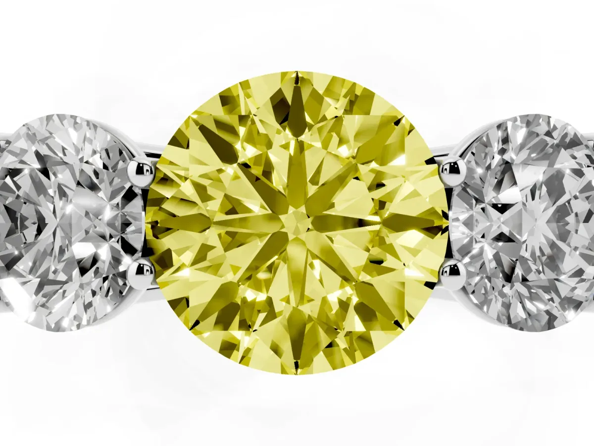 Fancy Yellow Round Cut Three-Stone Diamond Ring with Prong Setting on a Classic Band Silver