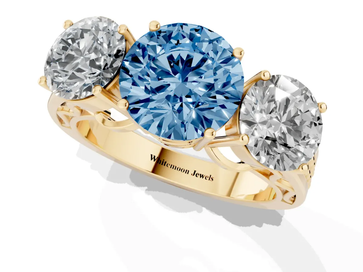 Fancy Blue Round Cut Diamond Three-Stone Ring with Prong Setting and Textured Band Yellow gold