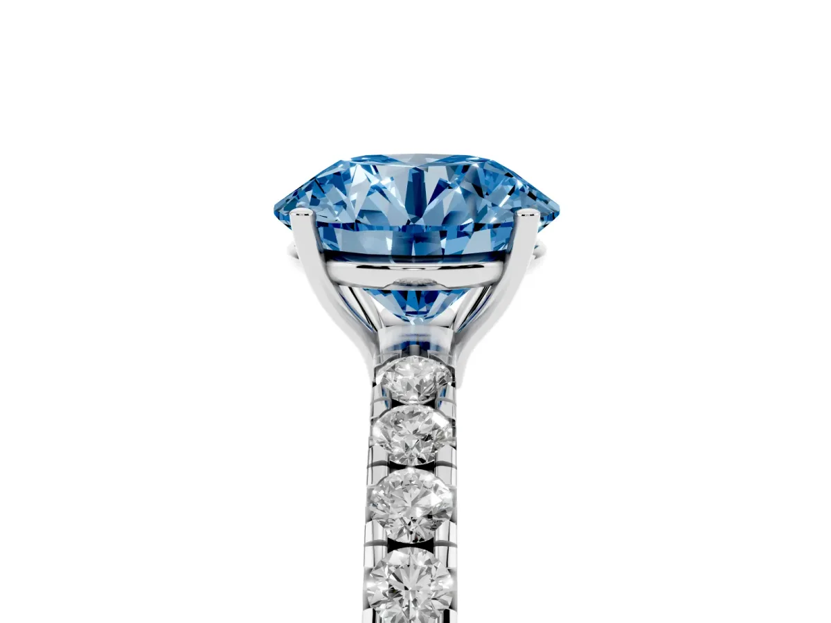 Fancy Blue Round Cut Diamond Pavé Solitaire Engagement Ring with Four-Prong Setting Silver