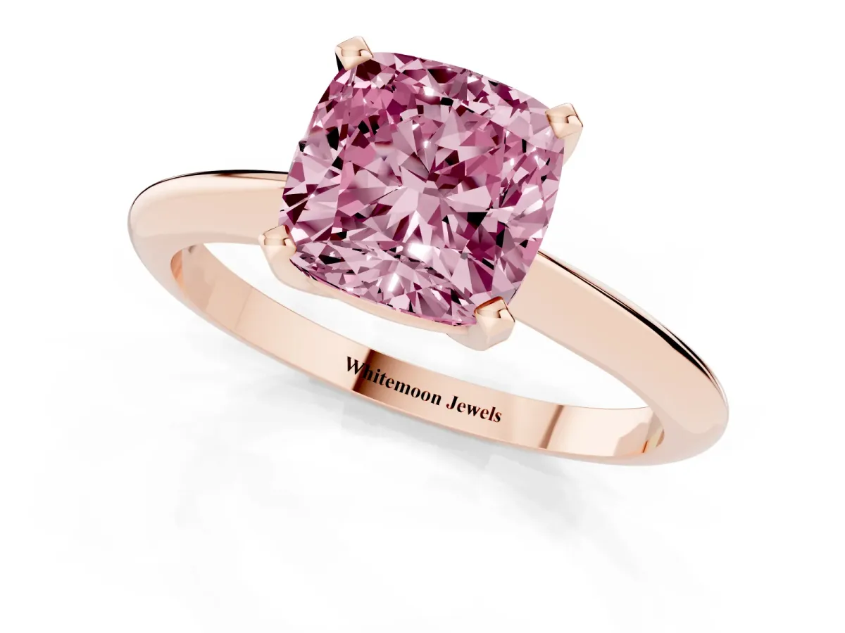 Fancy Pink Cushion Cut Cut Solitaire Ring with Four-Prong Setting on a Classic Band Rose gold