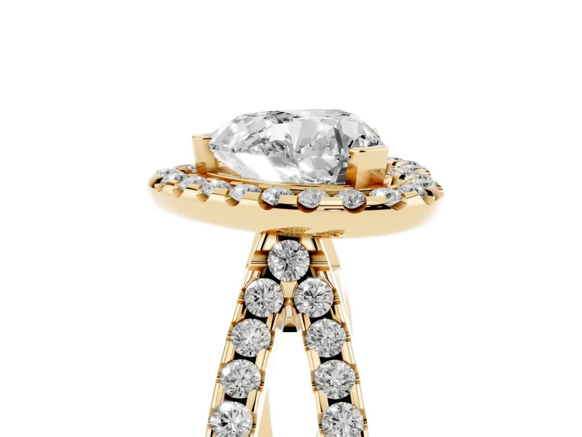 Heart Cut Diamond Halo Ring with Split Shank Pavé Band and Prong Setting Yellow gold