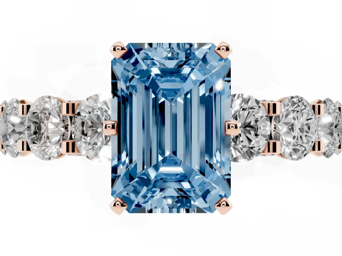 Fancy Blue Emerald Cut Diamond Side Stone Engagement Ring with Four-Prong Setting Rose gold