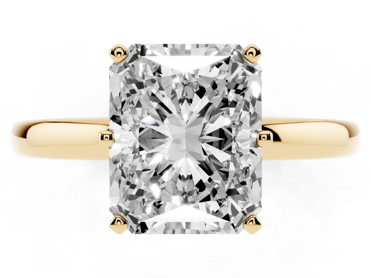 Radiant Cut Solitaire Diamond Ring with Six-Prong Setting on a Classic Band Yellow gold