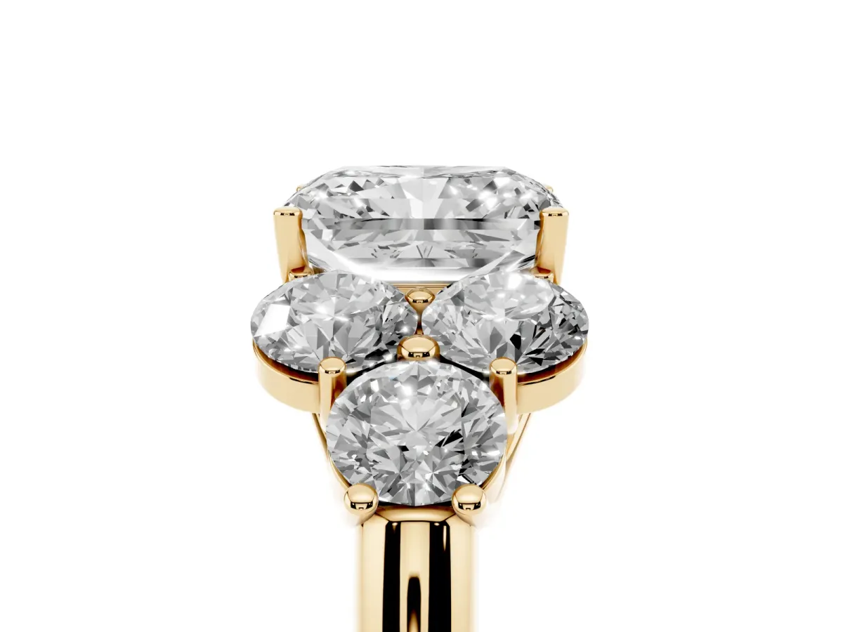 Radiant Cut Cut Diamond Cluster Ring with Round Accent Stones and Prong Setting on a Classic Band Yellow gold