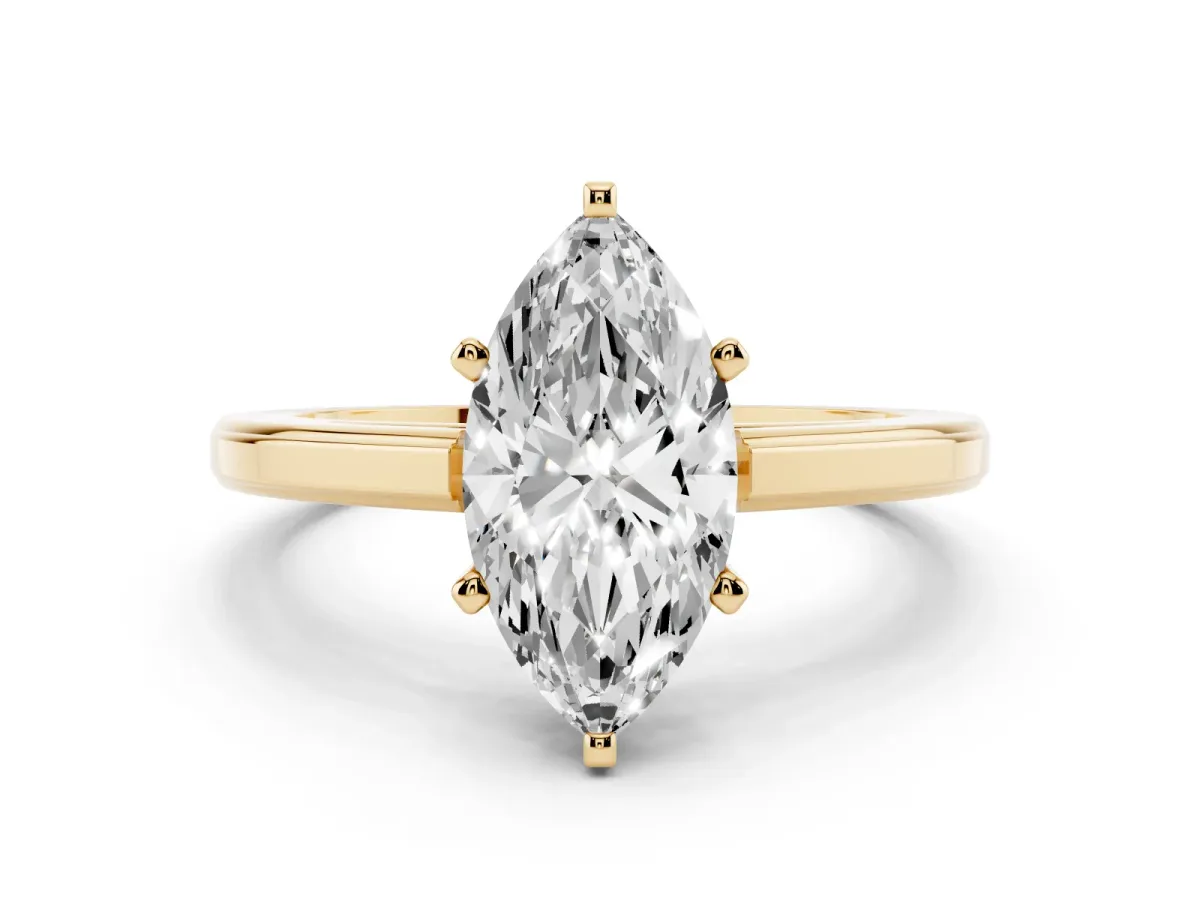 Marquise Cut Solitaire Diamond Ring with Four-Prong Setting and Classic Band Yellow gold