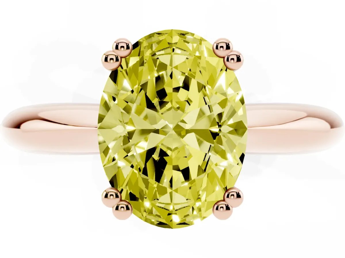 Fancy Yellow Oval Cut Cut Solitaire Engagement Ring with Tapered Band and Four-Prong Setting Rose gold
